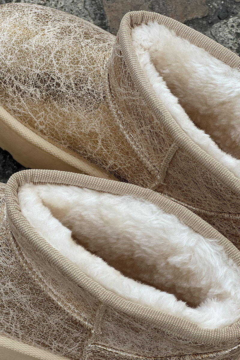 Bottes dorées fourrées basses à plateforme