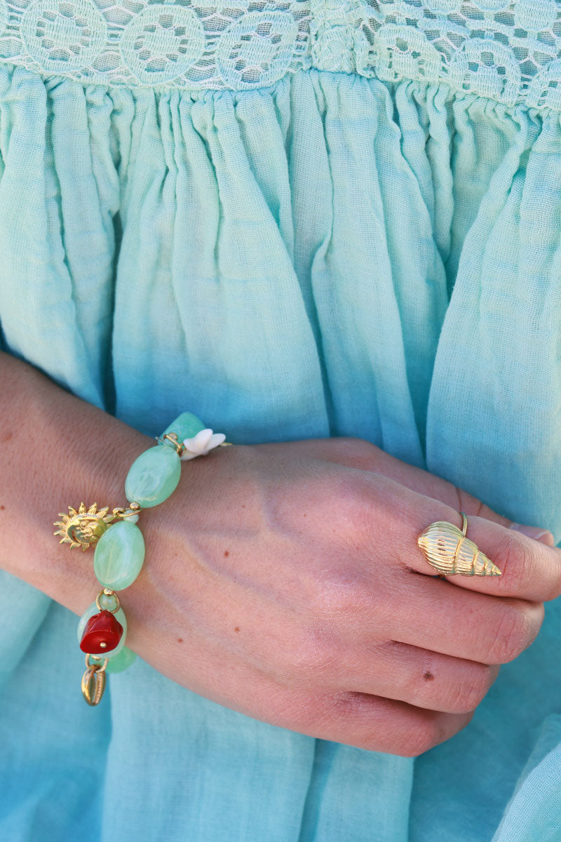 Bracelet élastique en perles résines turquoise style pierres breloques plage