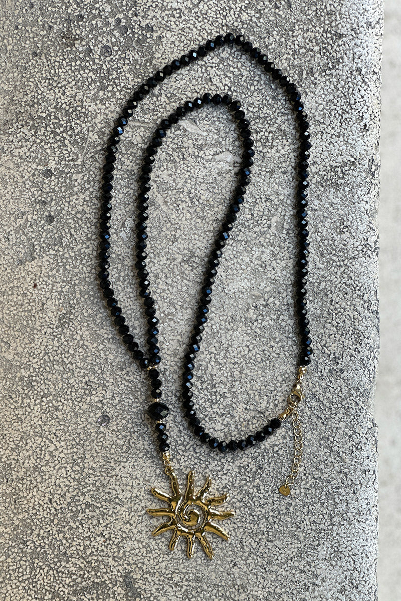 Black Bead and Golden Spiral Sun Necklace