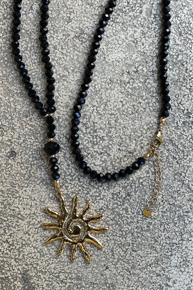 Black Bead and Golden Spiral Sun Necklace