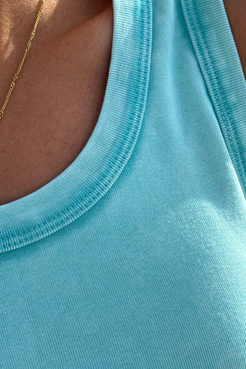 Débardeur en coton turquoise délavé petit patch smiley dos