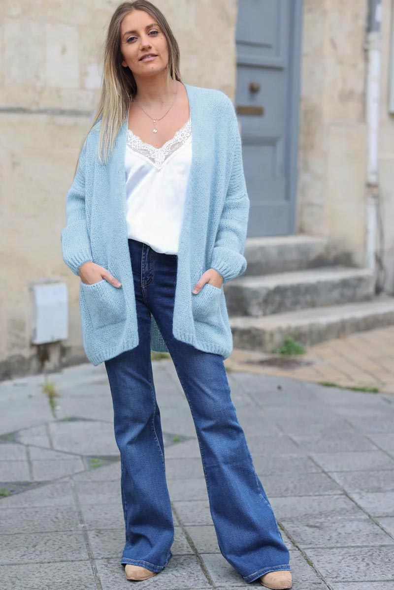 Gilet bleu ciel col enveloppant avec poches