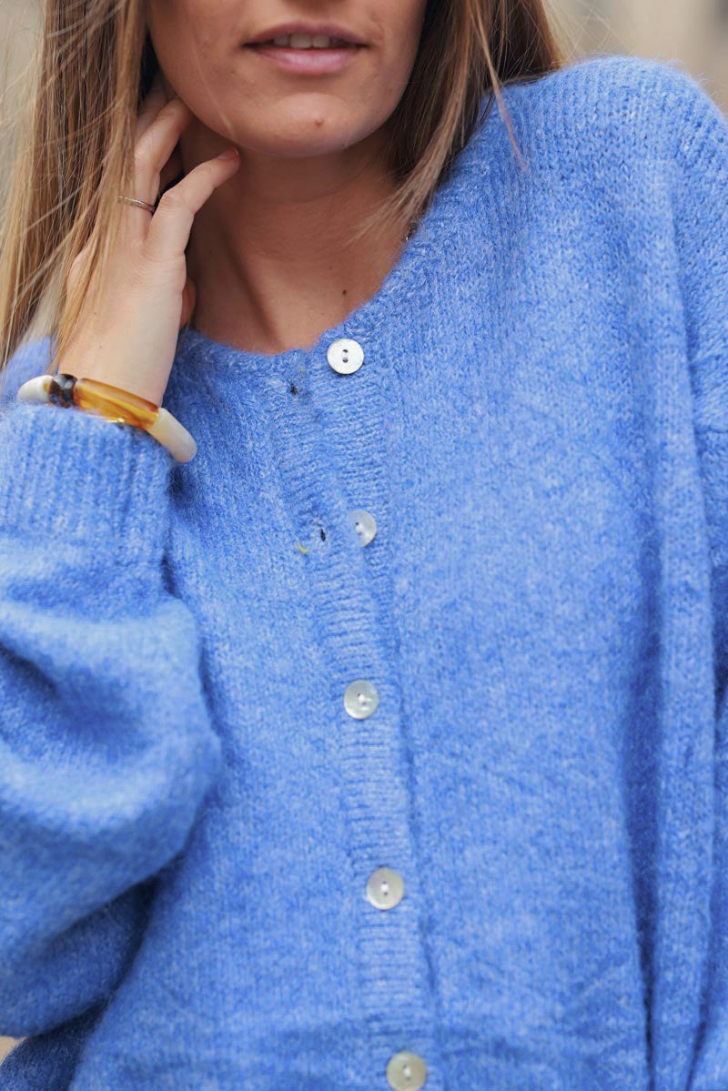 Gilet douillet bleu chiné en maille col rond boutons nacrés