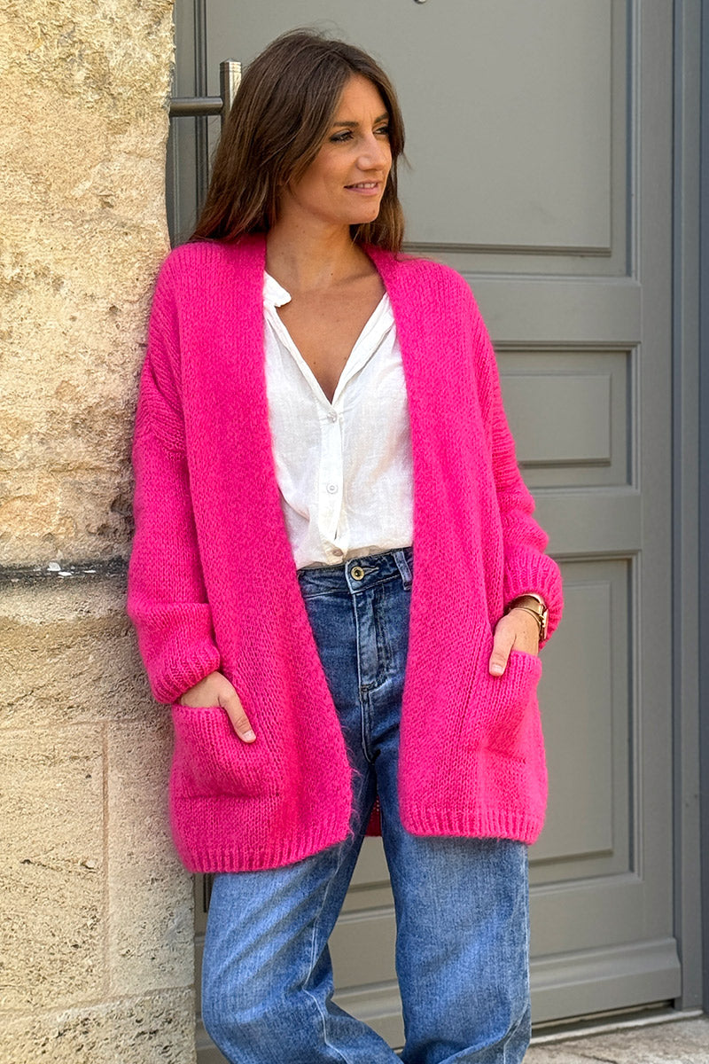 Gilet fuchsia col enveloppant avec poches