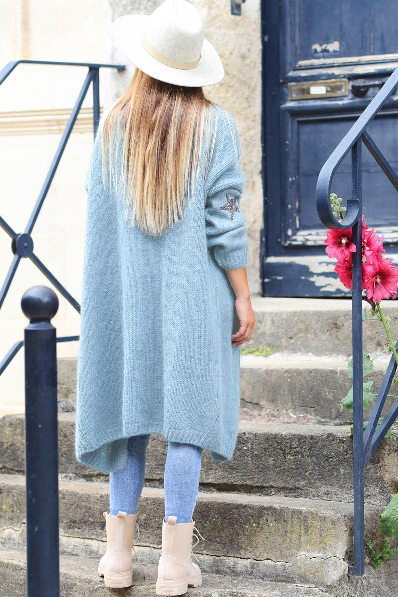 Gilet long droit bleu ciel grosses mailles étoile strass manches