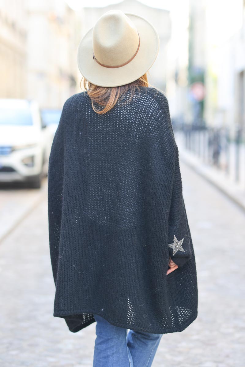 Black medium-long chunky knit cardigan with rhinestone star detail