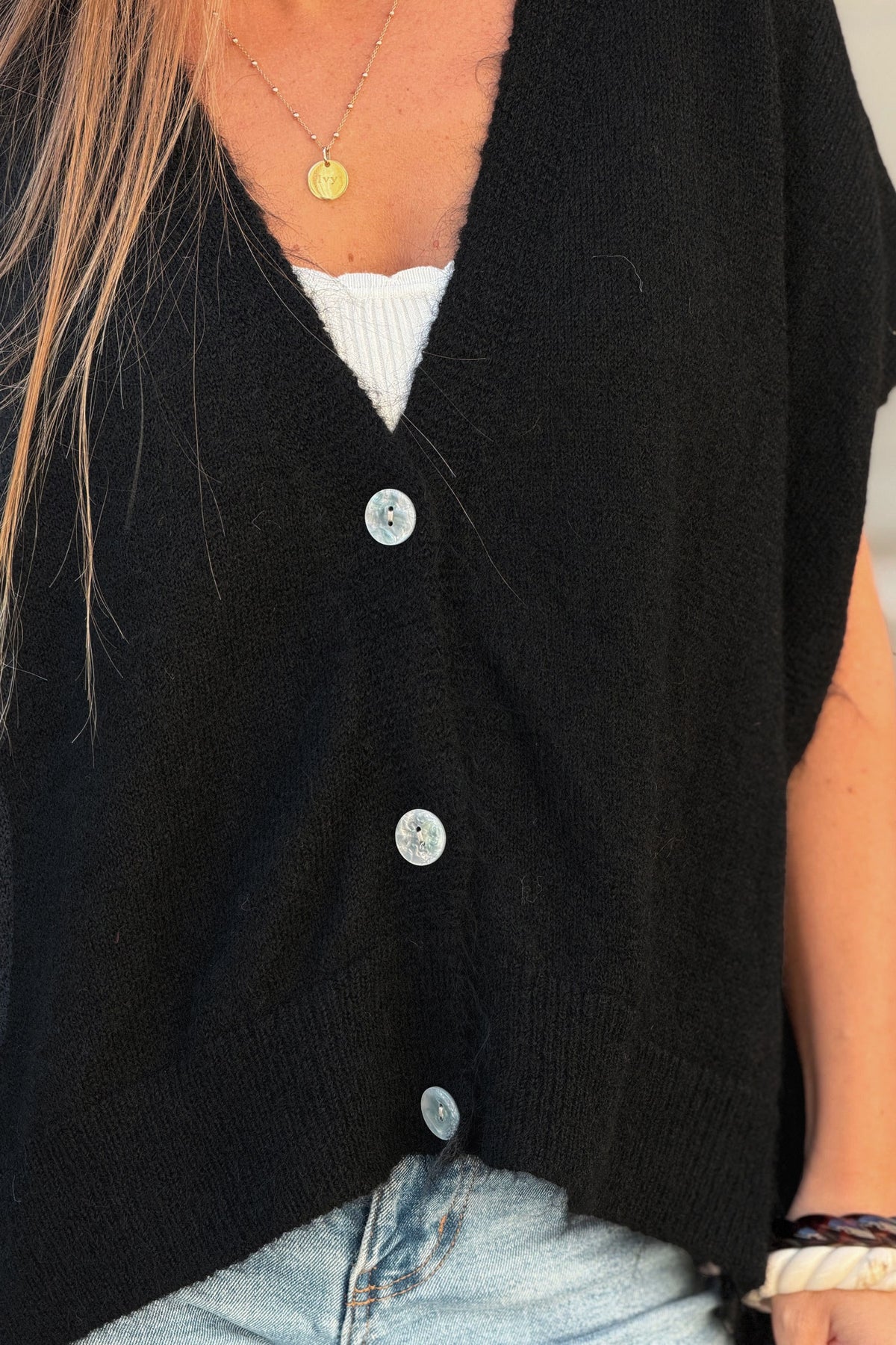 Gilet sans manches noir coupe loose en maille chinée boutons nacrés