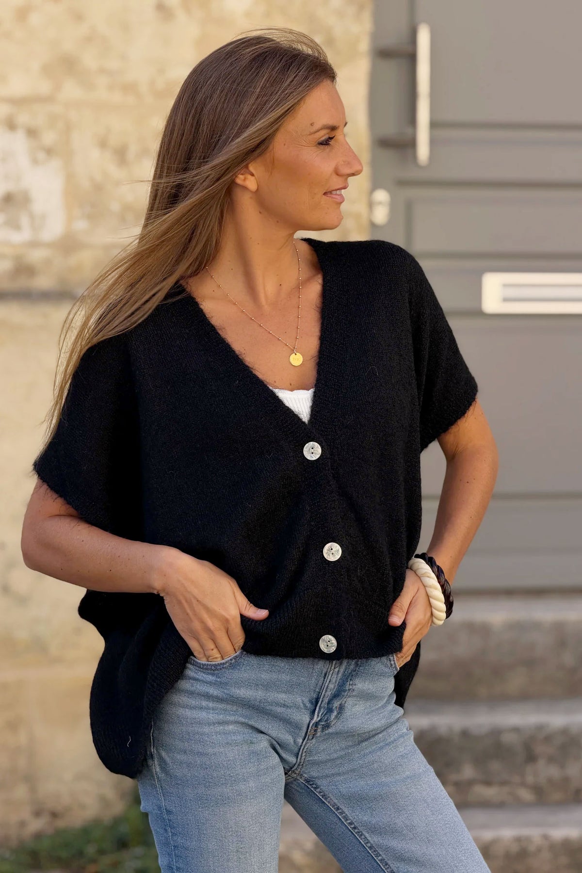 Gilet sans manches noir coupe loose en maille chinée boutons nacrés