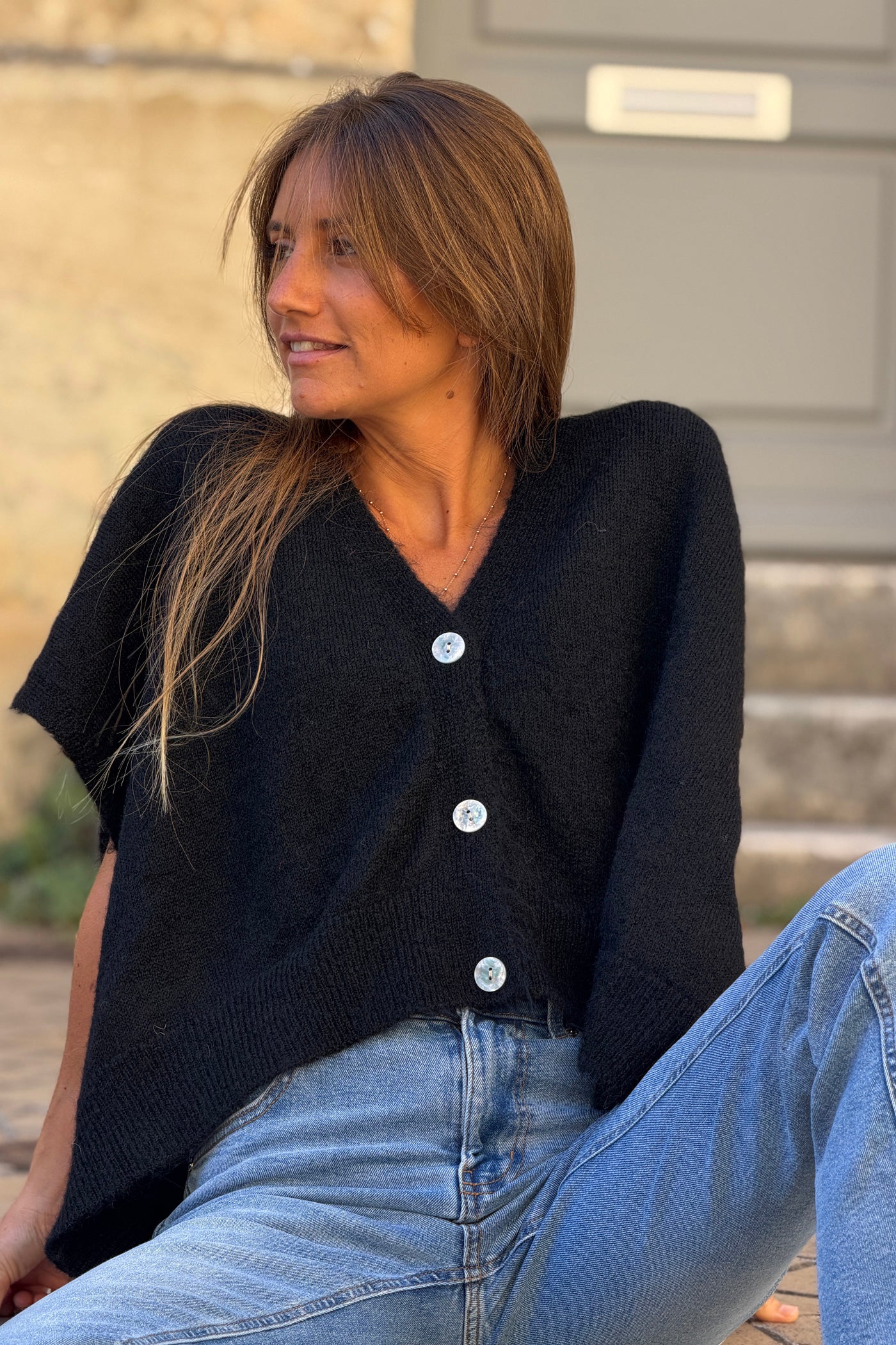 Gilet sans manches noir coupe loose en maille chinée boutons nacrés