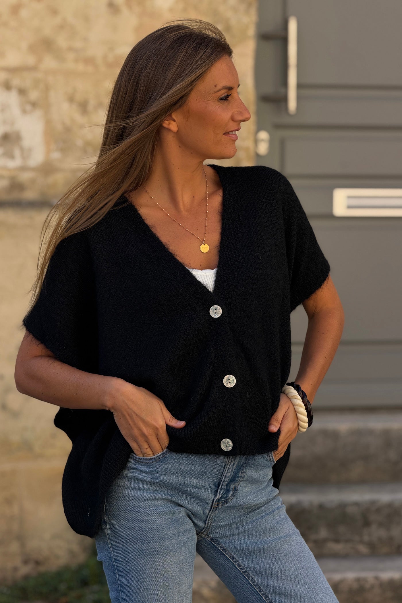 Gilet sans manches noir coupe loose en maille chinée boutons nacrés