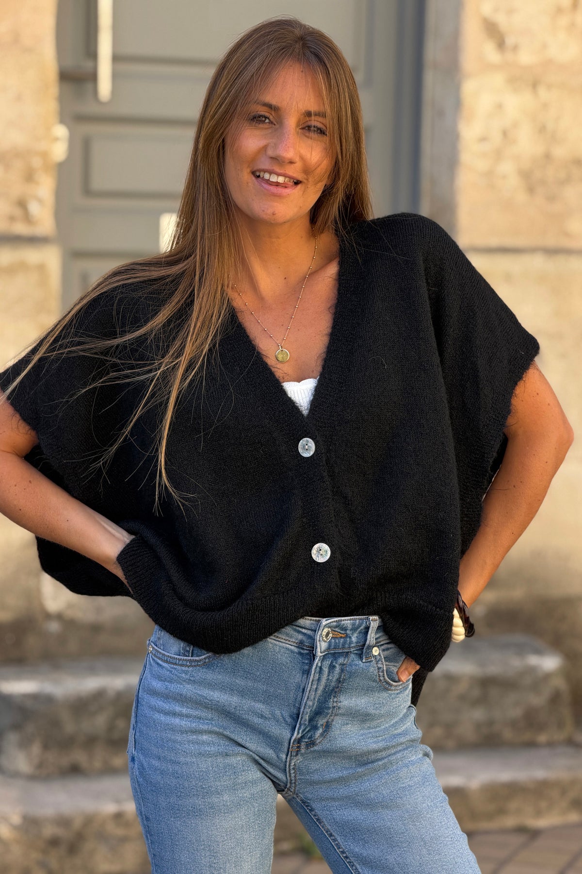 Gilet sans manches noir coupe loose en maille chinée boutons nacrés