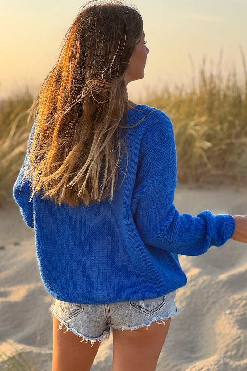 Gilet uni bleu roi en maille petits boutons nacrés