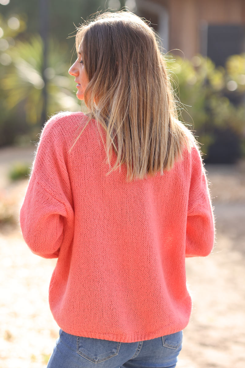 Coral mother of pearl button through v-neck cardigan