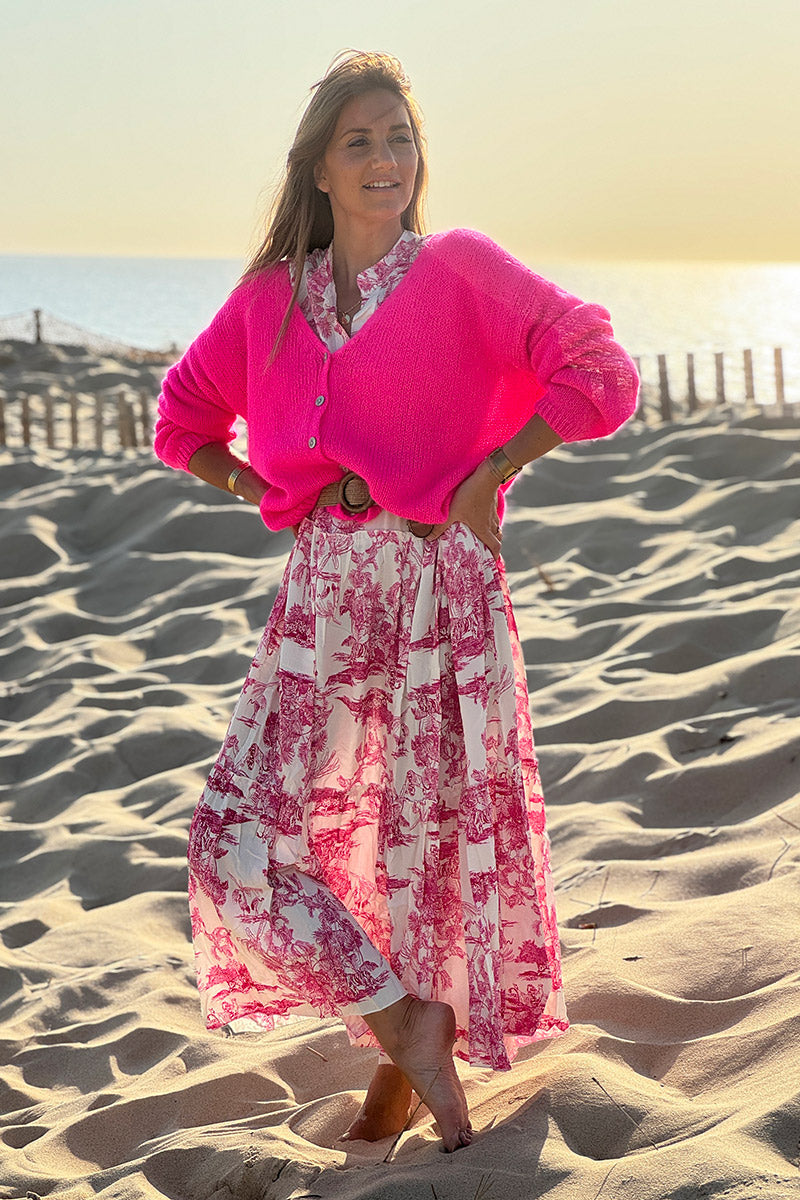 Gilet uni fuchsia fluo en maille fine avec petits boutons nacrés