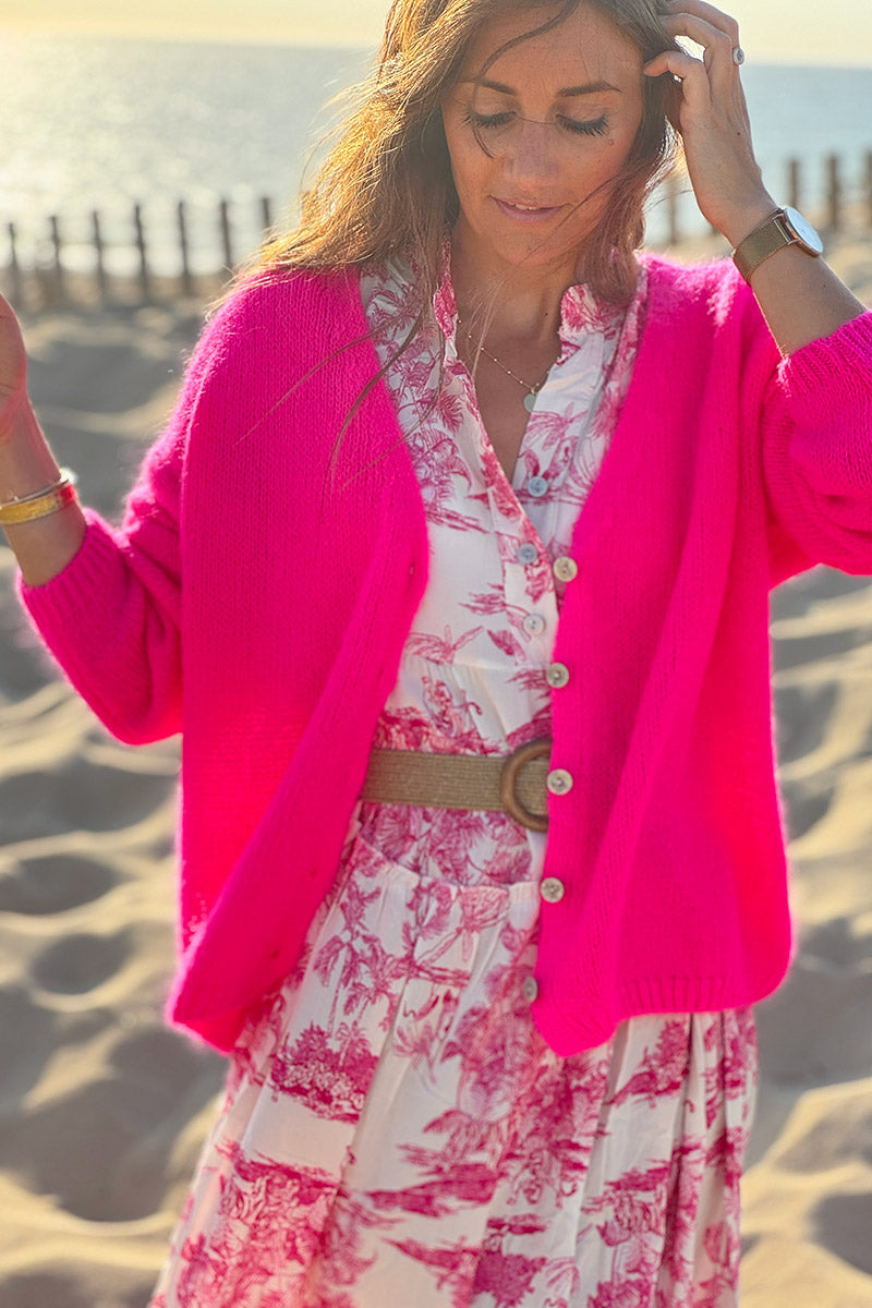 Gilet uni fuchsia fluo en maille fine avec petits boutons nacrés