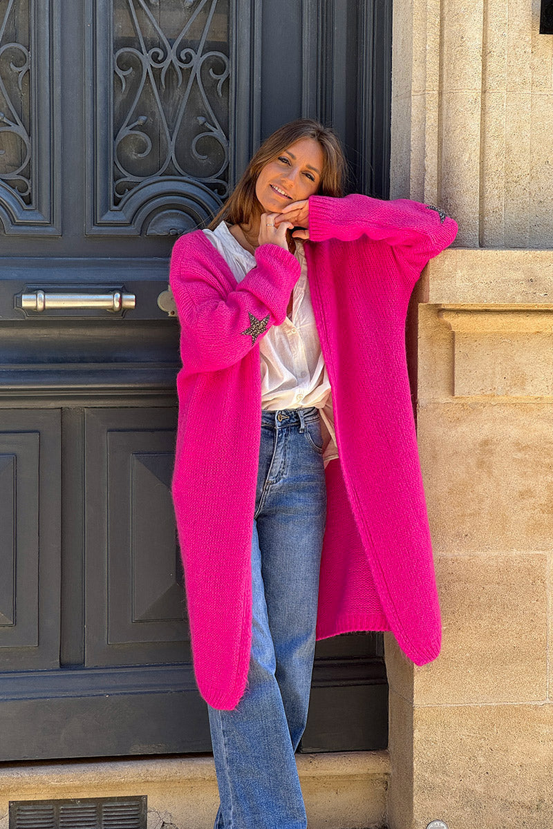 Gilet long droit fuchsia grosses mailles étoile strass manches