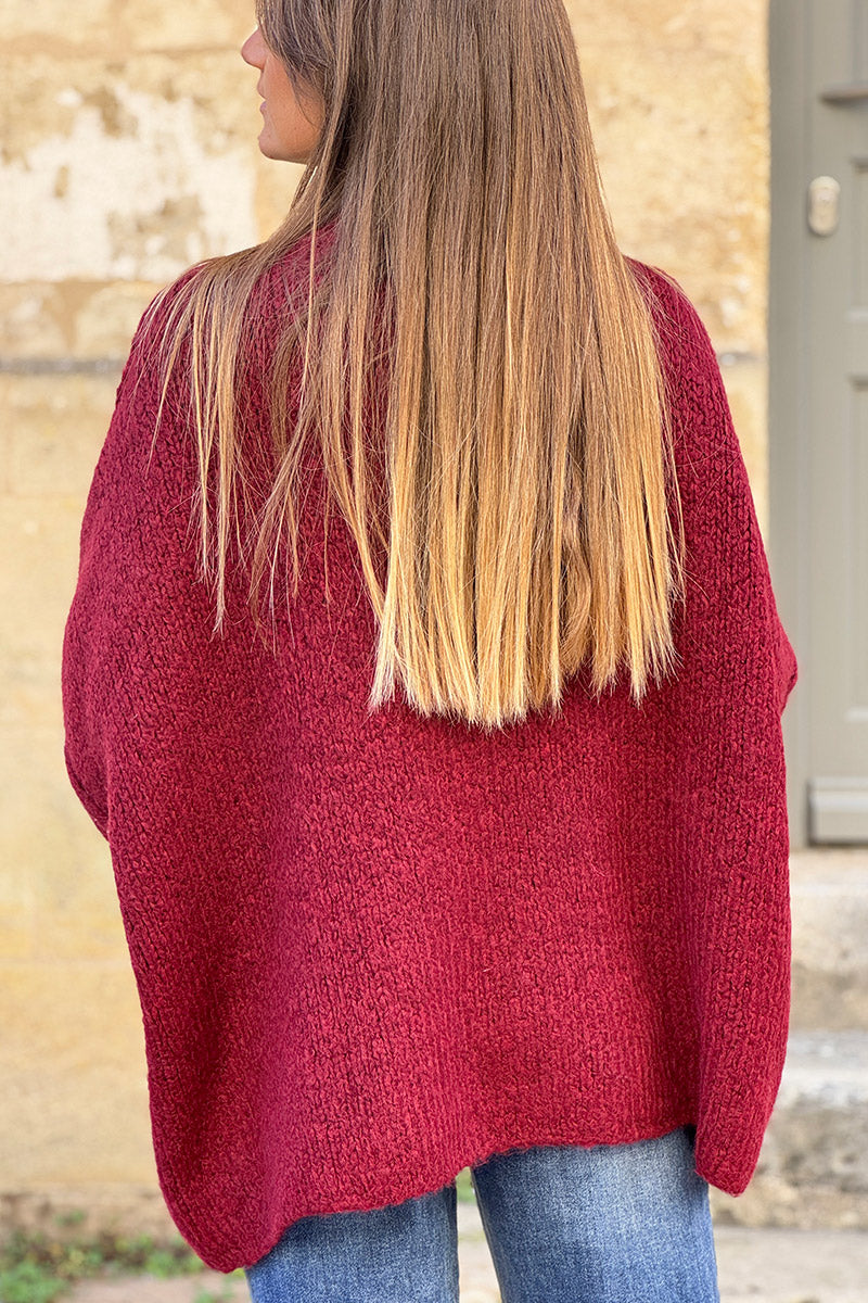 Gros pull large bordeaux en maille chaude couture apparente