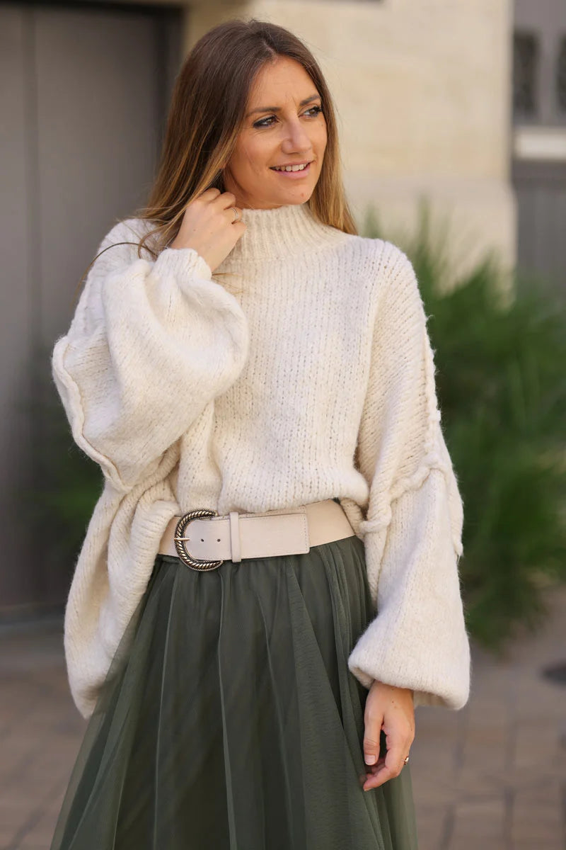 Gros pull large écru en maille chaude couture apparente