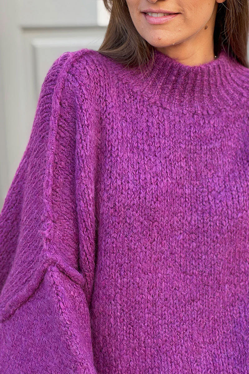 Gros pull large violet en maille chaude couture apparente