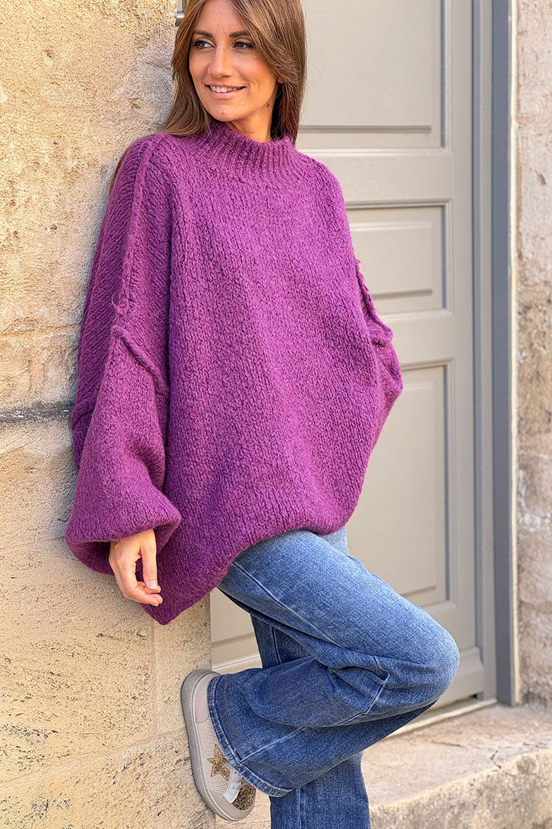 Gros pull large violet en maille chaude couture apparente