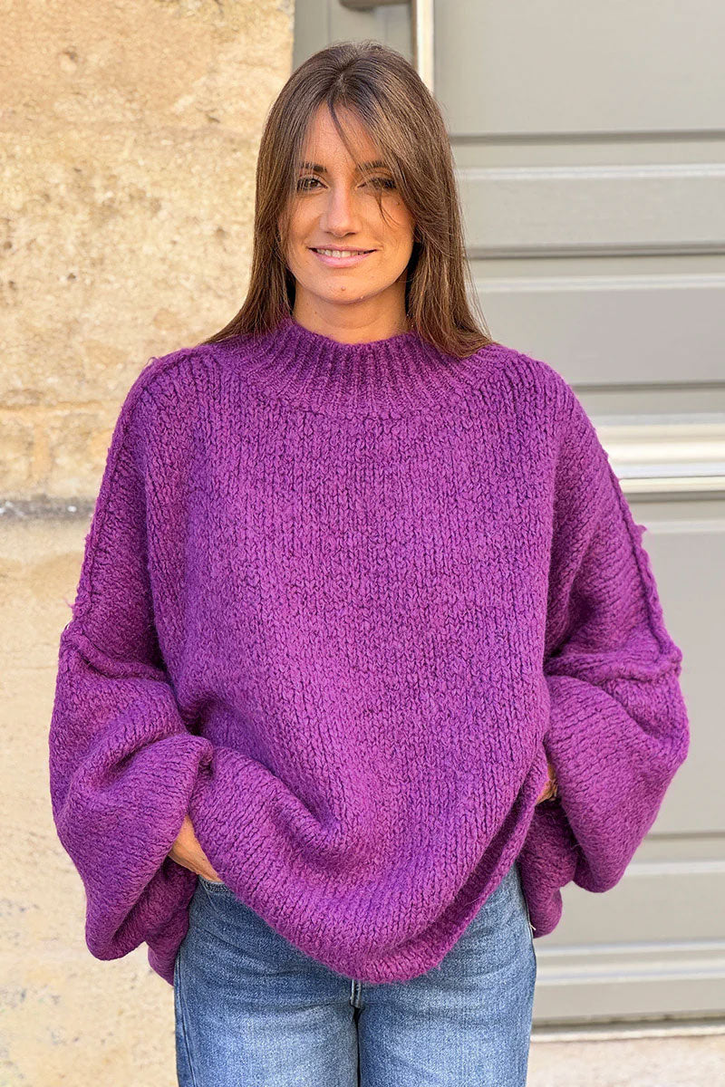 Gros pull large violet en maille chaude couture apparente