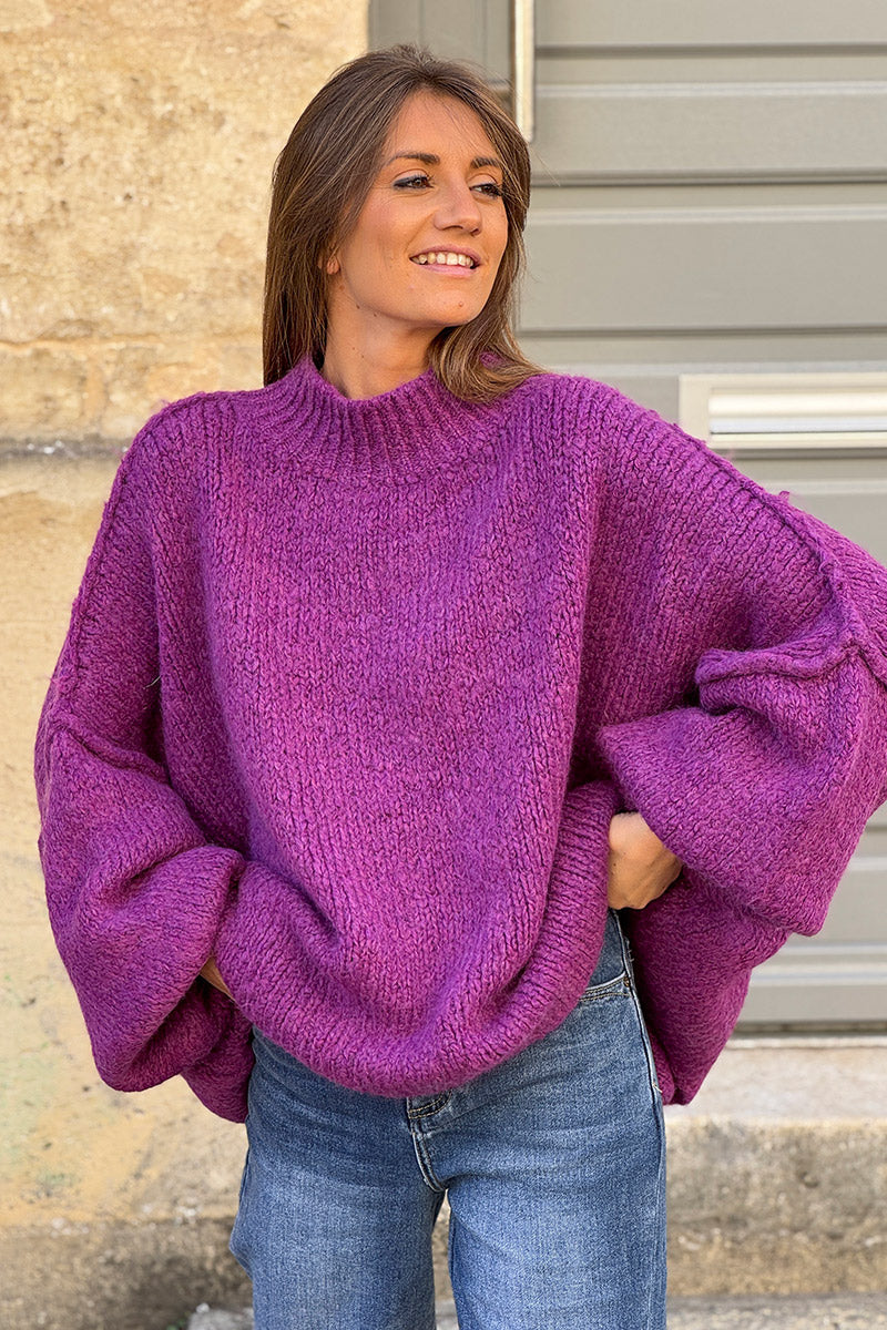 Gros pull large violet en maille chaude couture apparente