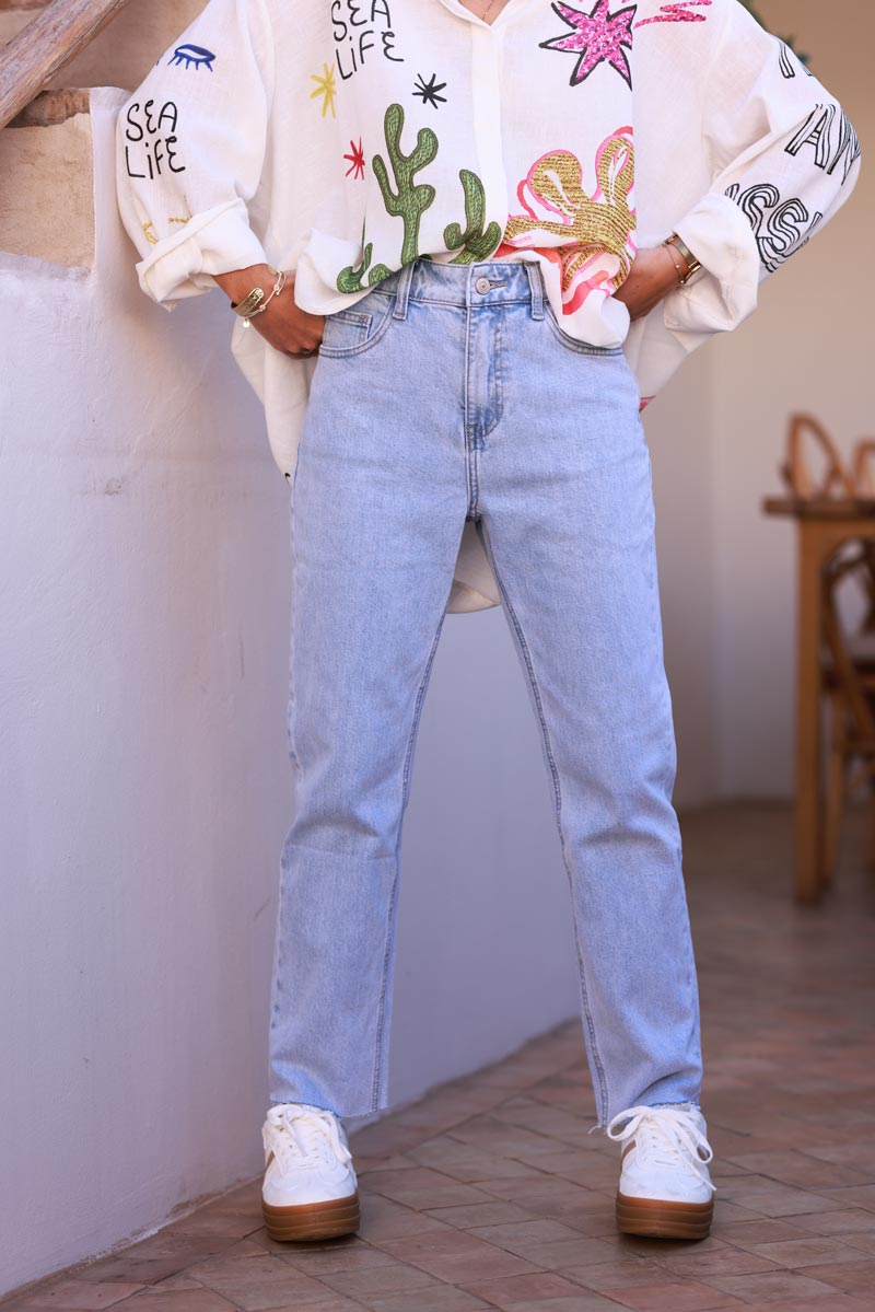 Jean délavage clair coupe droite détail cropped