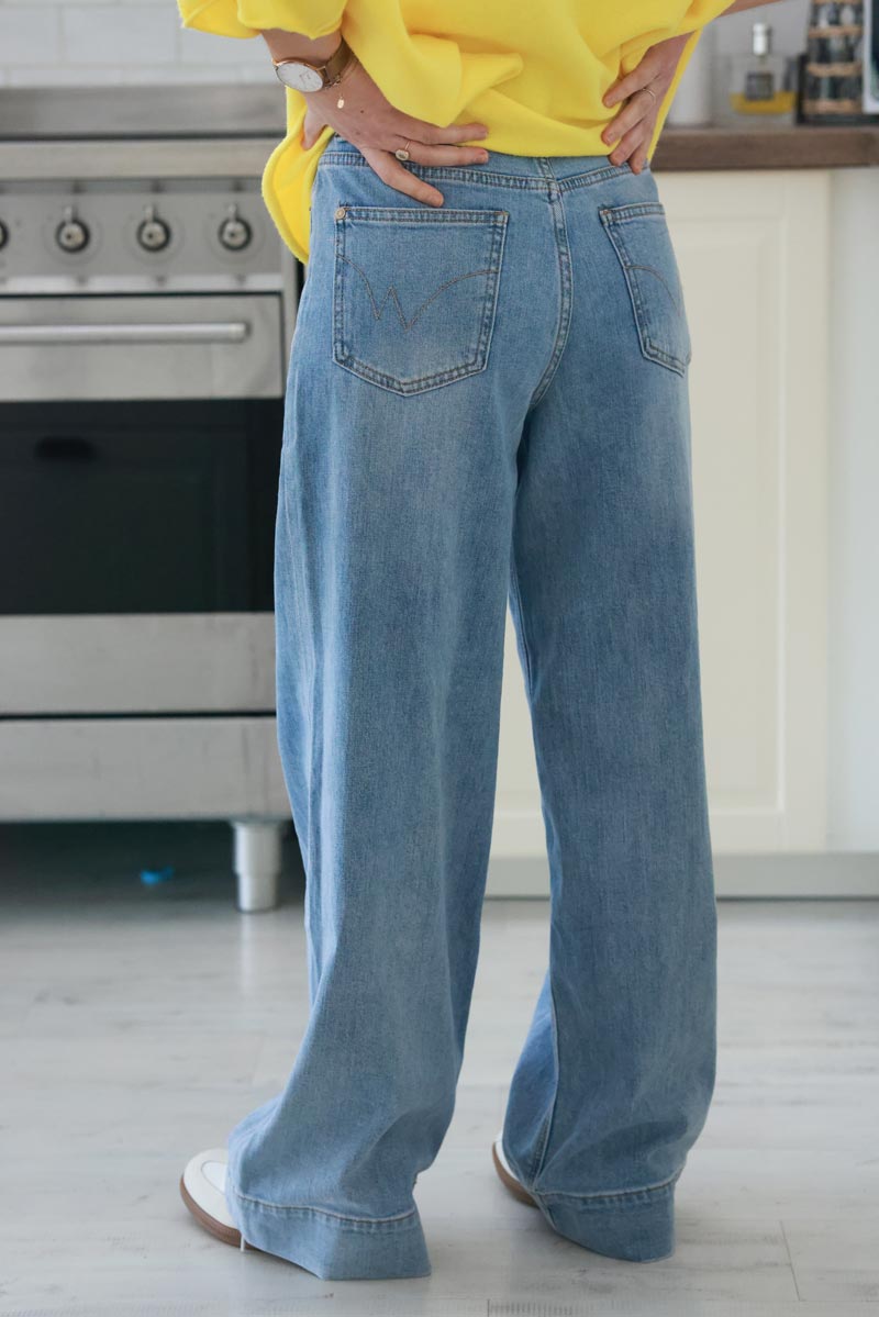 Light Wash Distressed Stovepipe Jeans with Embroidered Pocket