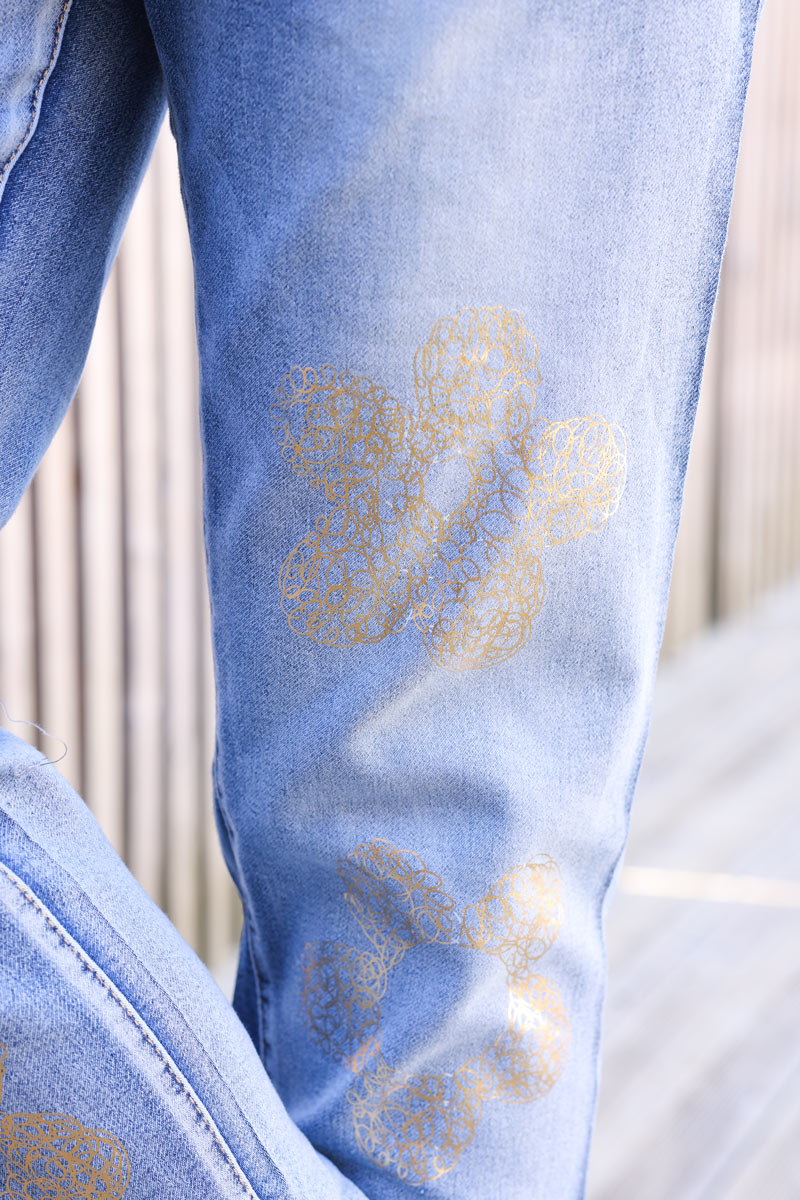 Mid-washed comfort stretch jeans with gold metallic flower print