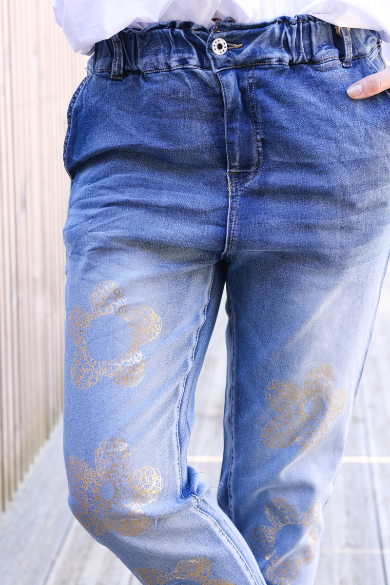 Mid-washed comfort stretch jeans with gold metallic flower print
