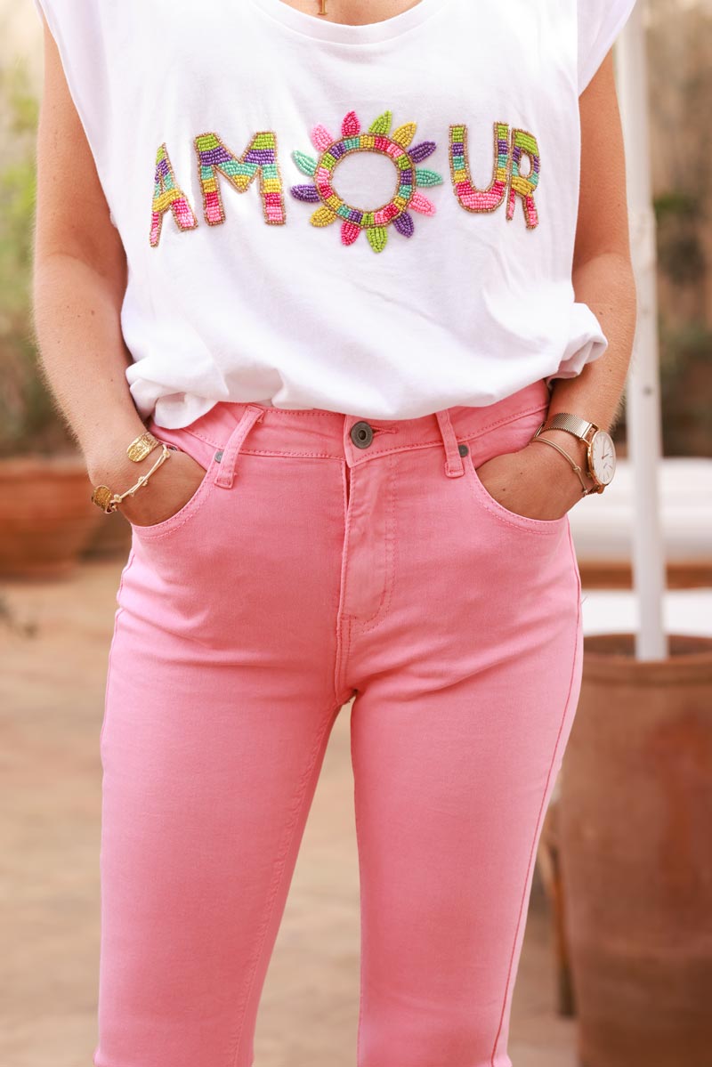 Jean rose coupe flare stretch cropped détail effiloché