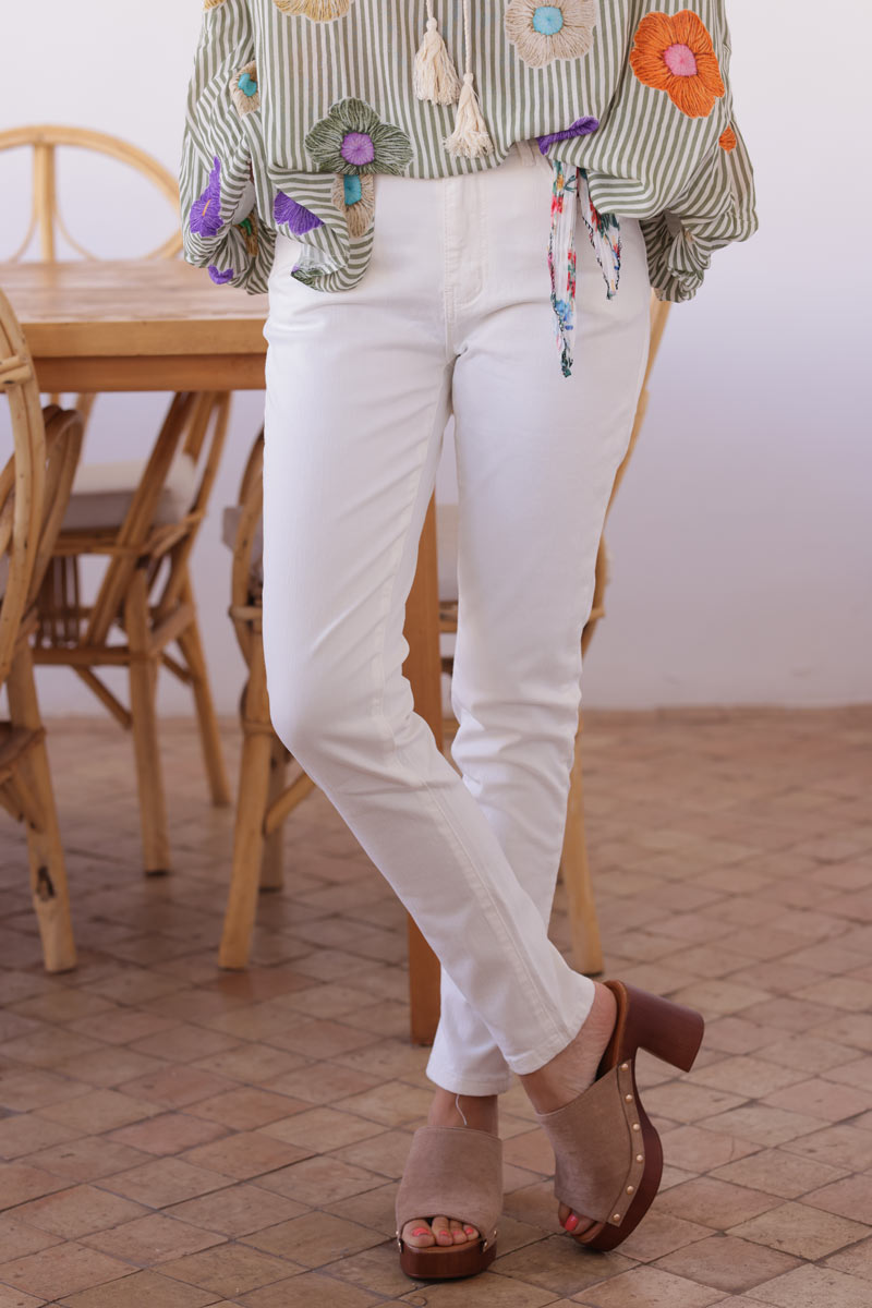 Off white stretch slim fit jeans with motif scarf belt