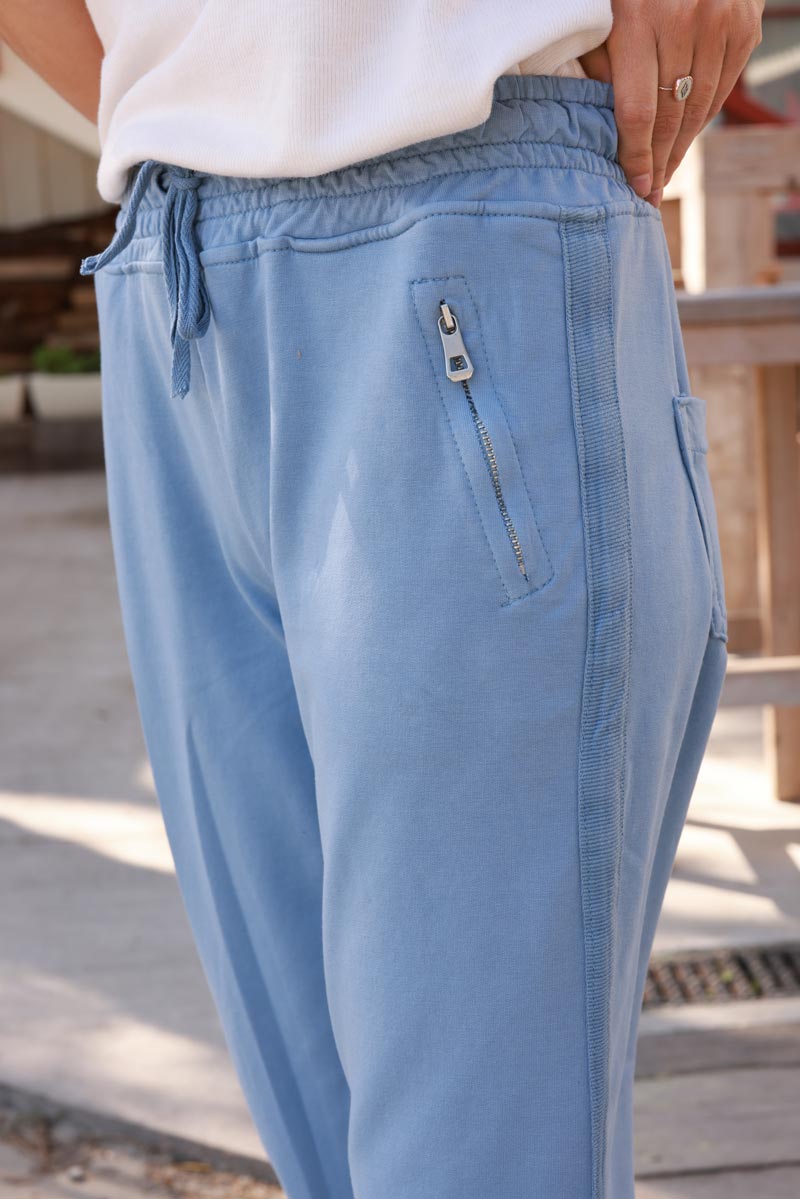 Jogging bleu jean liseré ruban sur le cote poches zip ceinture élastique