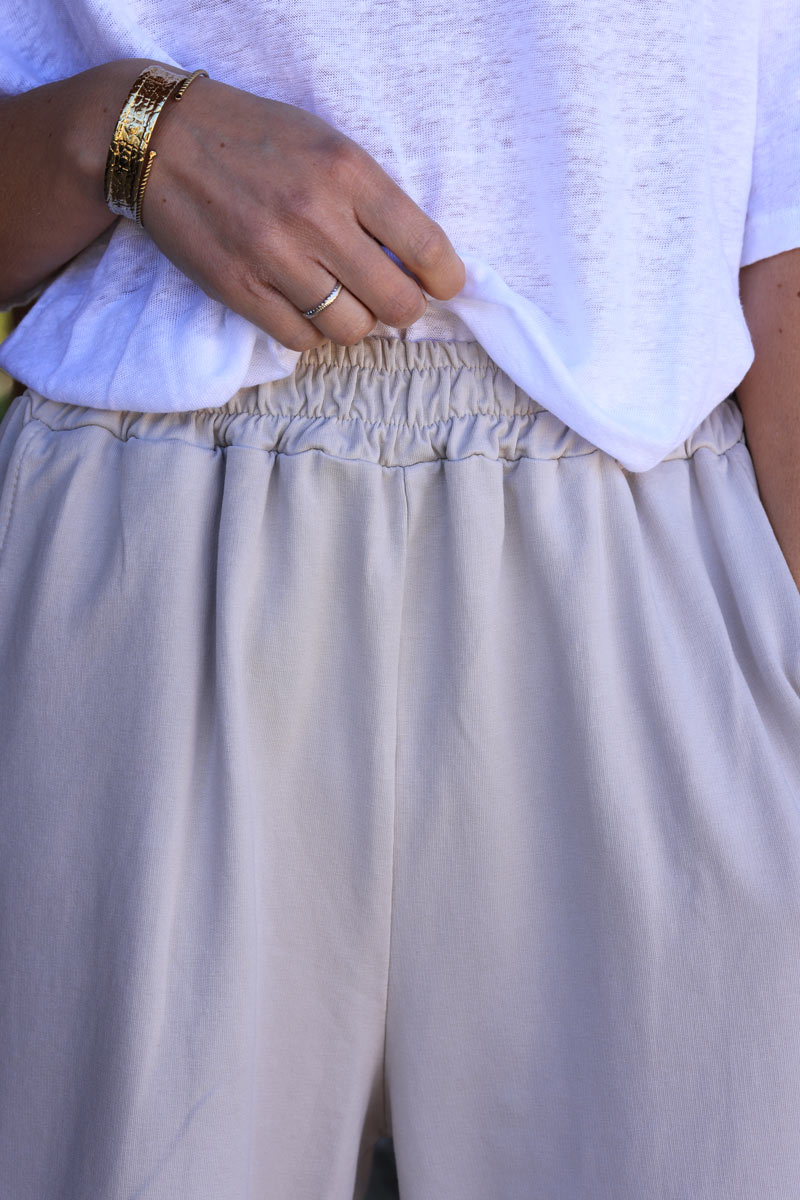 Beige stretch cotton wide leg flared sweatpants