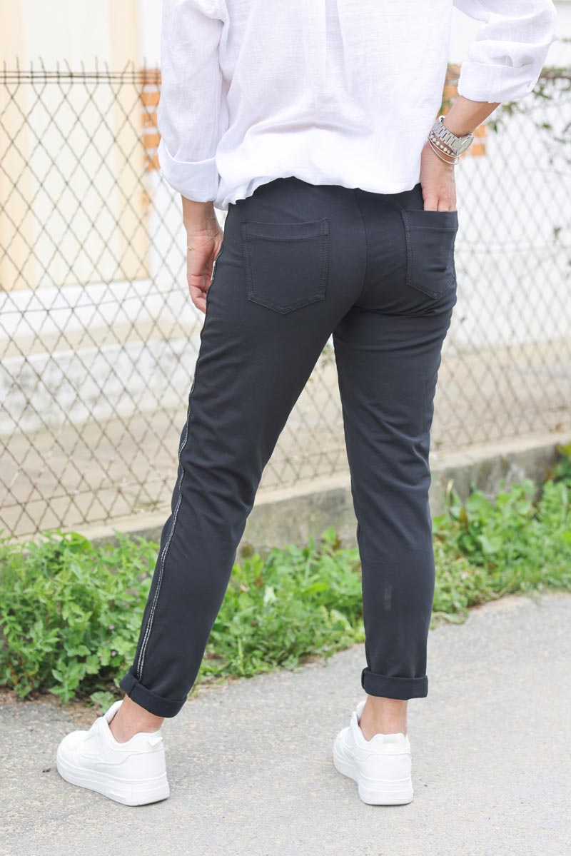 Jogging confort noir ceinture elastique lisere brillant sur les cotes H080 (1)