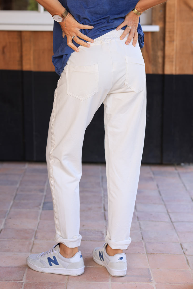 Ecru cotton jogging bottoms with embroidered cheveron outseams