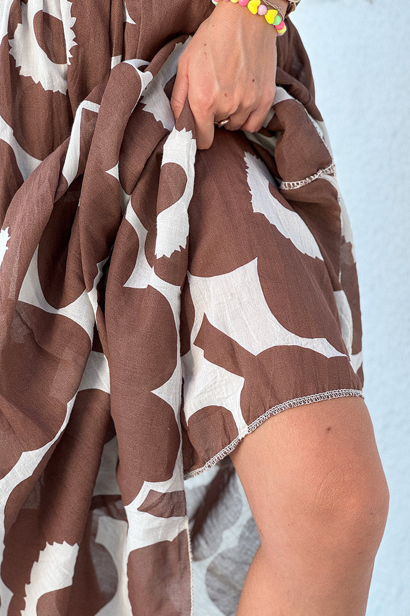 Jupe longue écrue en voile de coton doublé motifs grandes fleurs marron