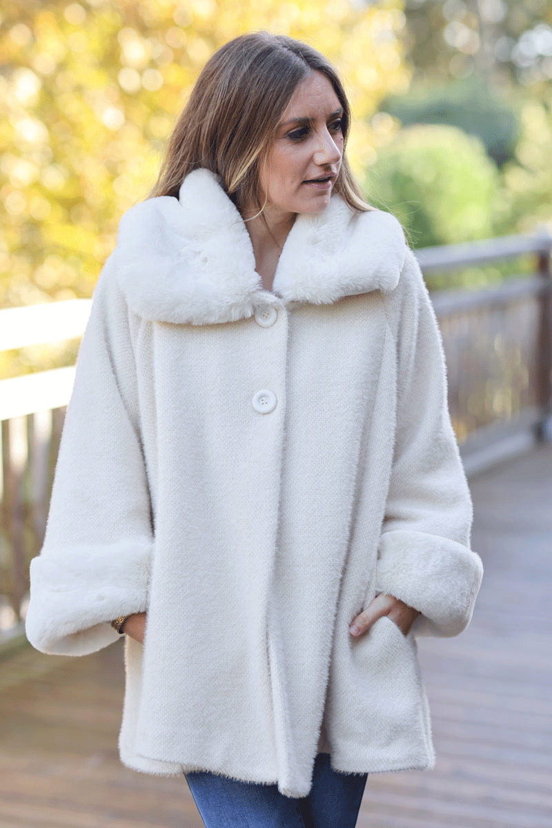 Poncho cape coat in ecru soft knit with faux fur collar and cuffs