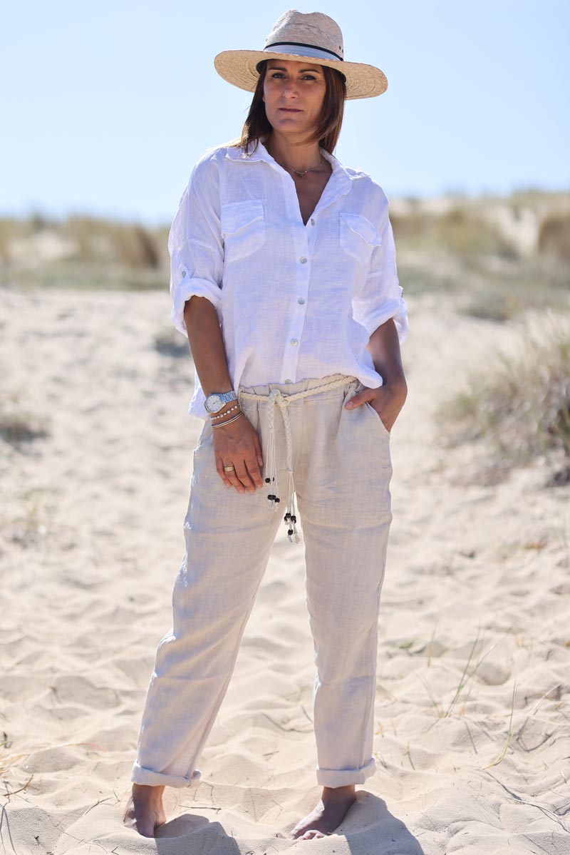 Beige linen trousers with crochet and wooden beaded belt