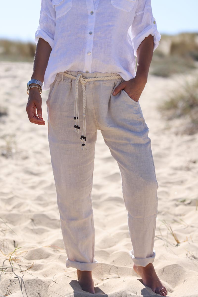 Beige linen trousers with crochet and wooden beaded belt