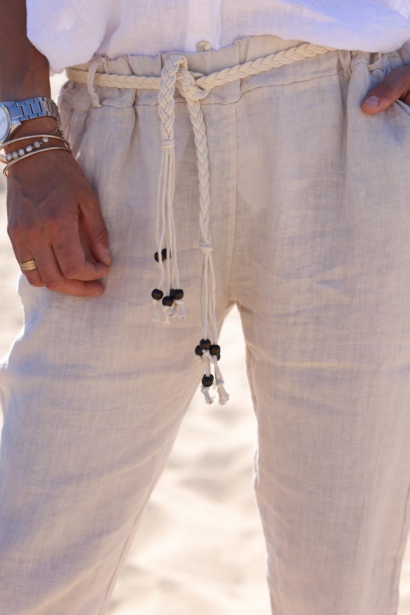Beige linen trousers with crochet and wooden beaded belt