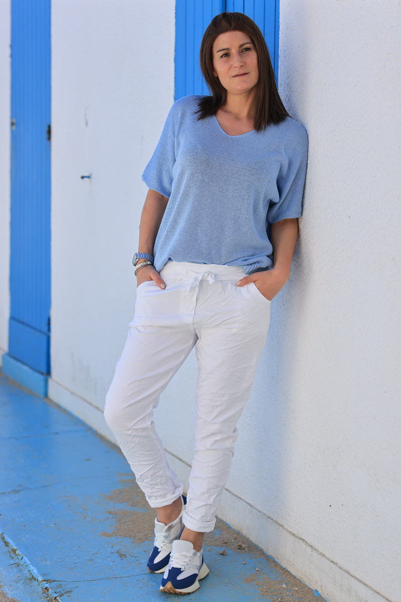 White comfort and stretch fabric pants with a glitter star