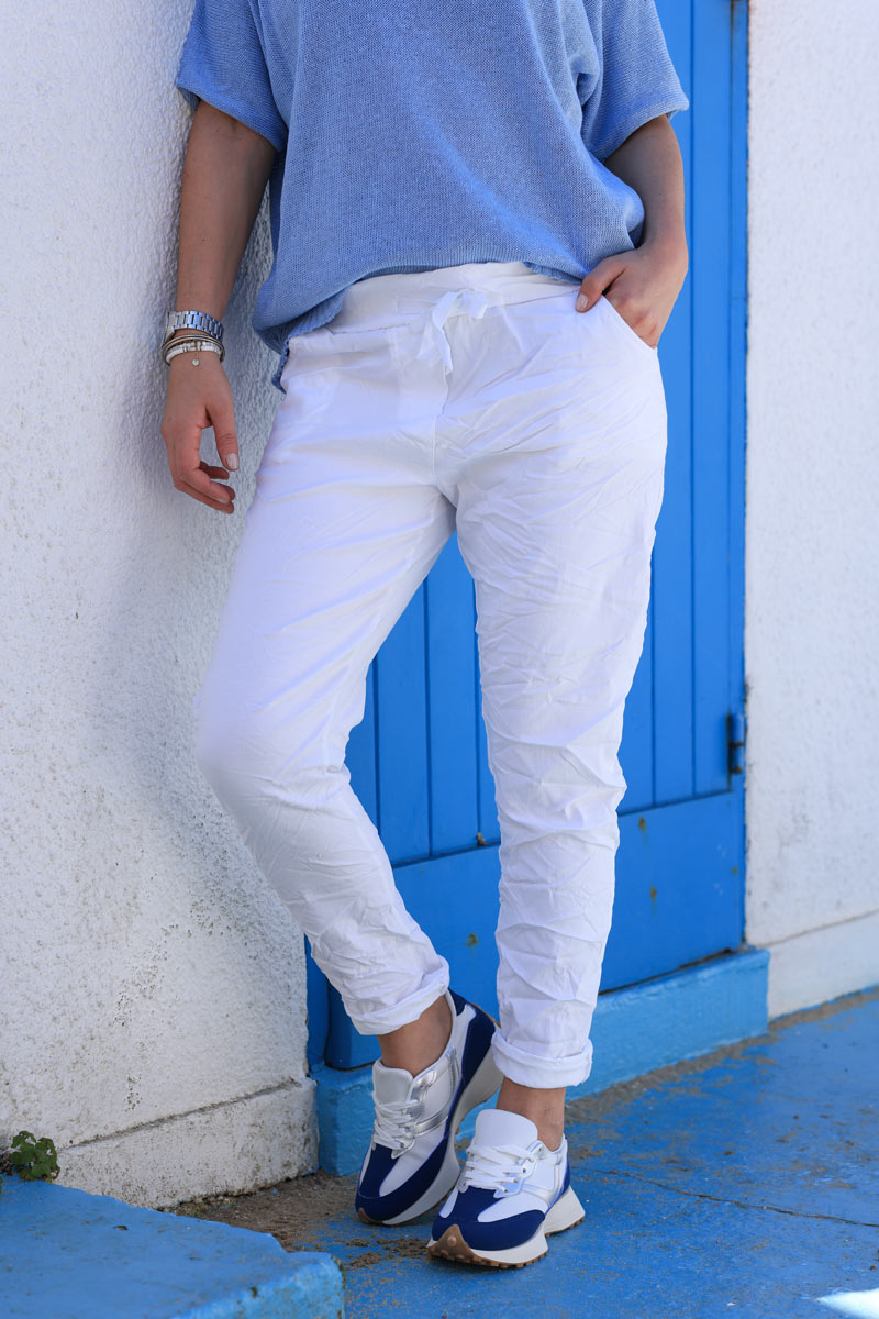 White comfort and stretch fabric pants with a glitter star