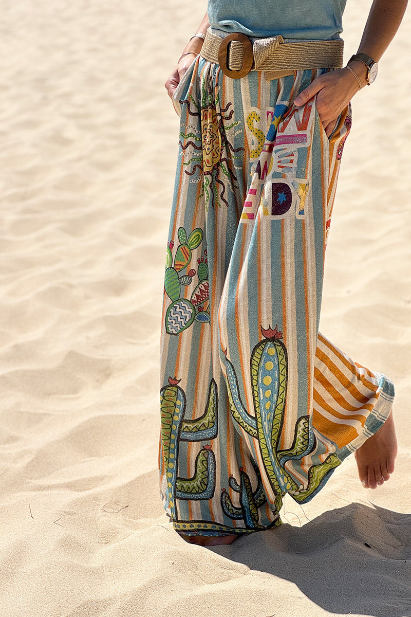Pantalon confort et souple brillant coupe large imprimé rayures oranges et bleues soleil et cactus