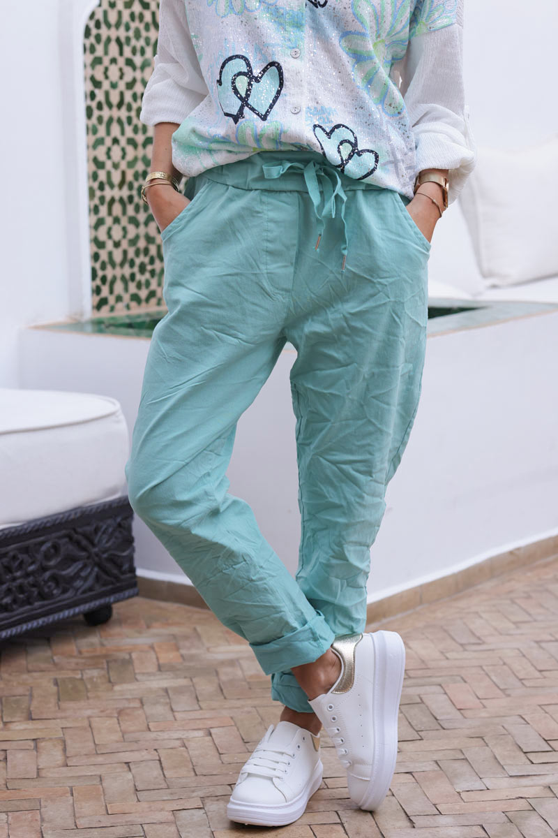 Pantalon confort turquoise en toile stretch étoile brillante paillettes