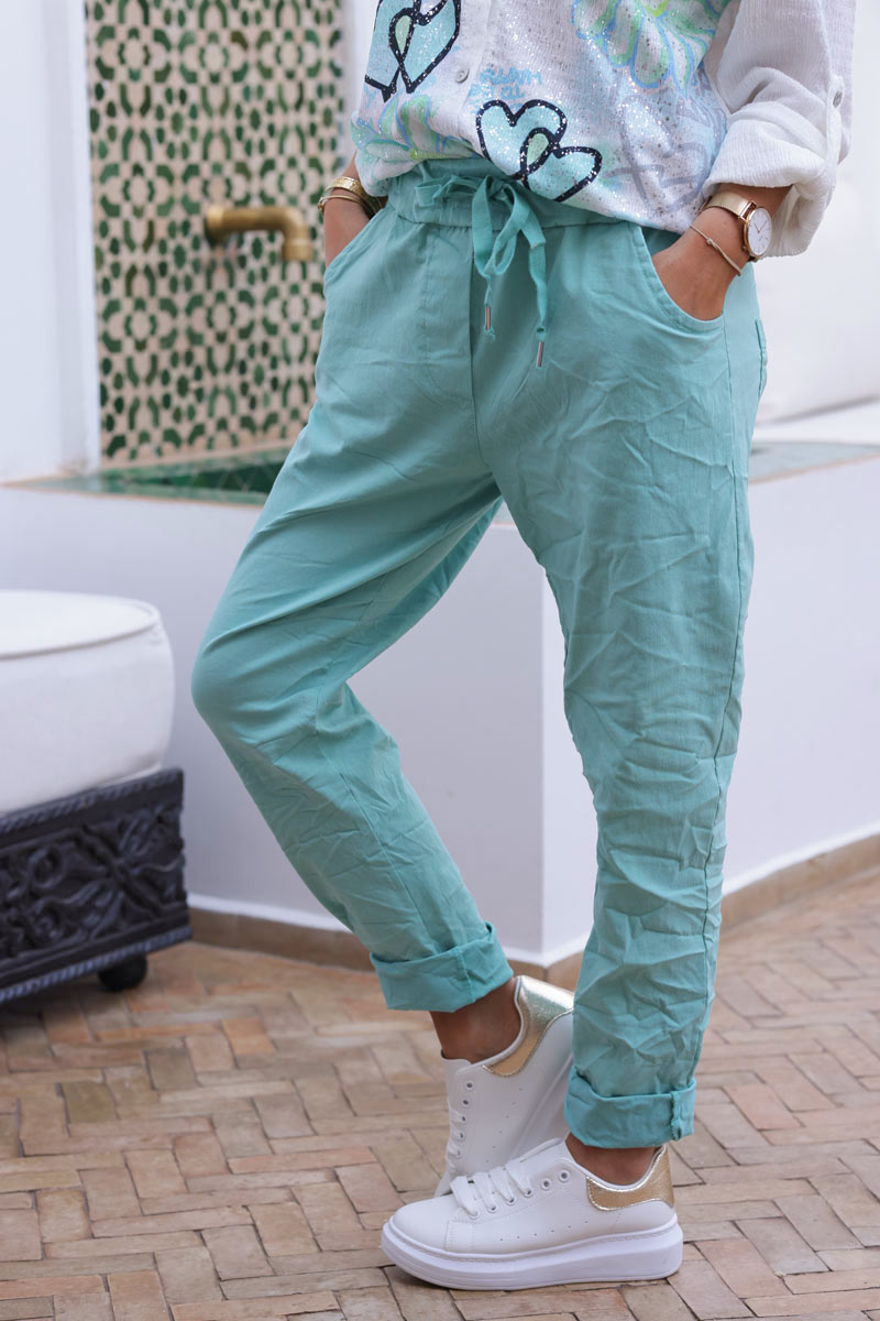 Pantalon confort turquoise en toile stretch étoile brillante paillettes