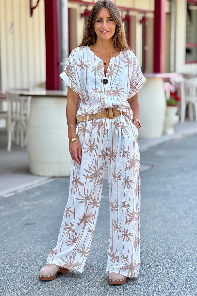 Pantalon fluide blanc cassé imprimé palmiers beige avec ceinture raphia