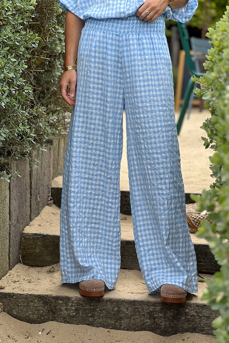 Pantalon fluide bleu ciel imprimé vichy taille élastique smockée