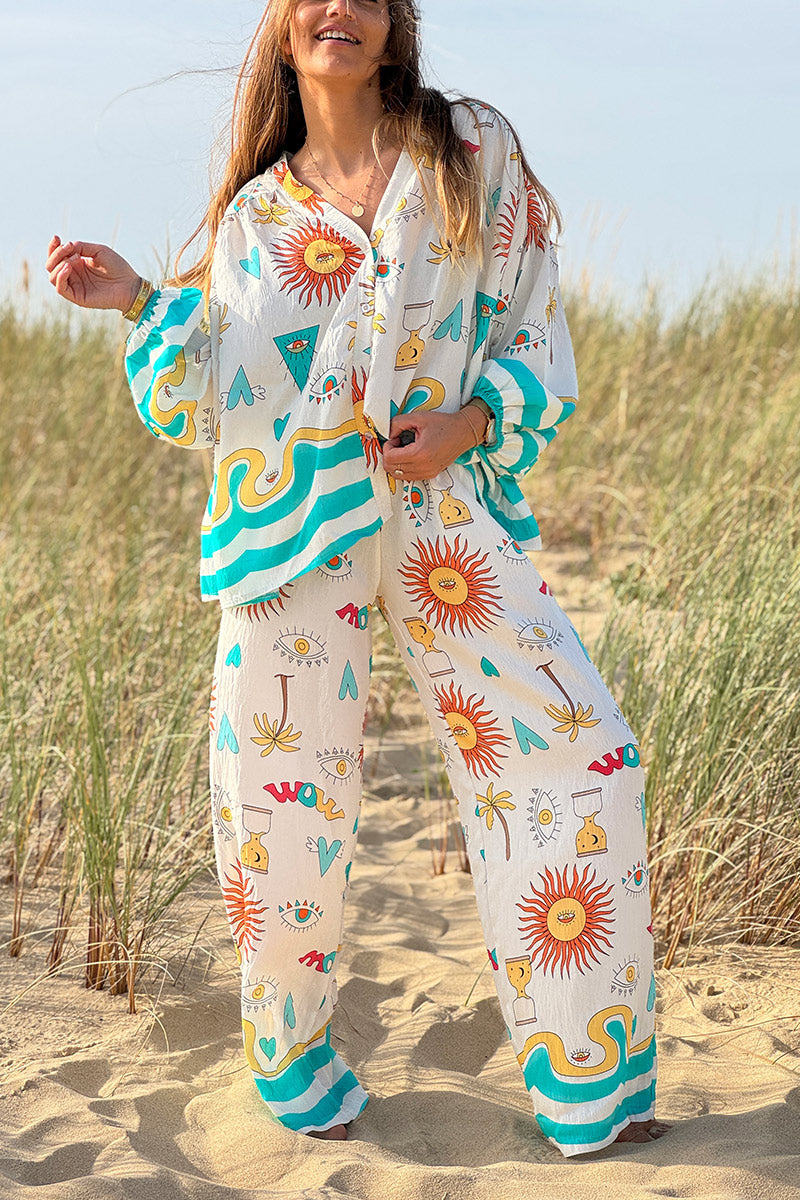 Pantalon fluide écru symboles soleil œil et cœurs colorés turquoise