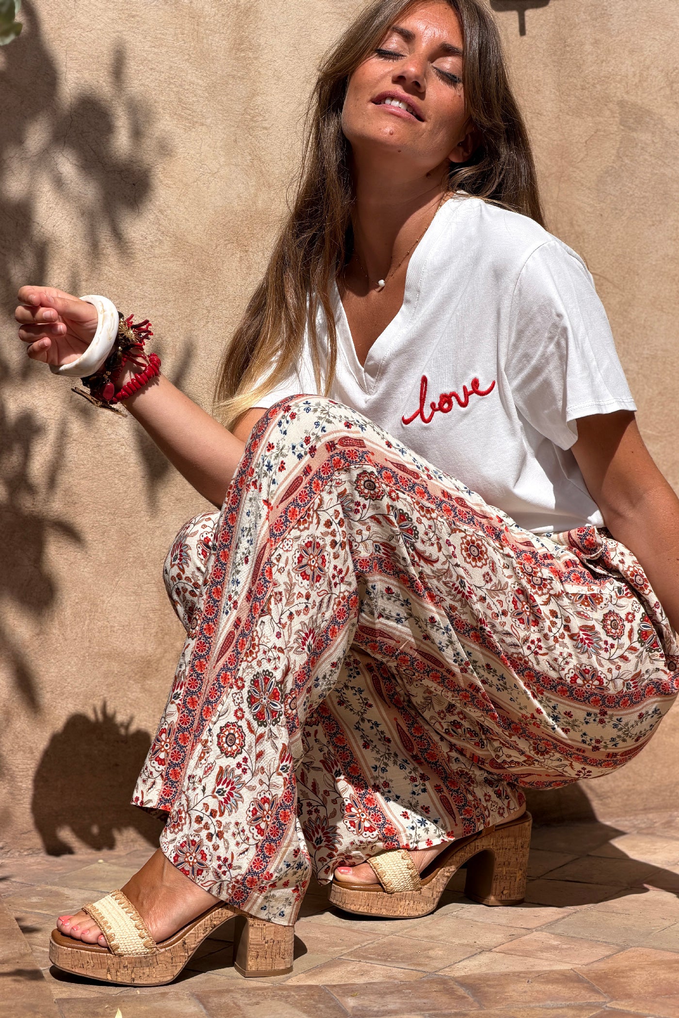 Pantalon fluide imprimé fleurs paisley terracotta effet rayures